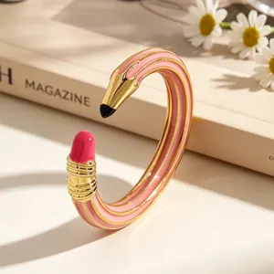 Kreatives emailliertes Manschettenarmband in Bleistiftform mit rosa-goldenen Details