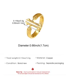 Detail view of golden double cross ring with weight and size specifications