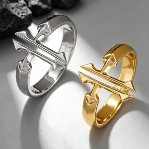 Detail view of elegant double cross open rings in polished silver and gold finishes