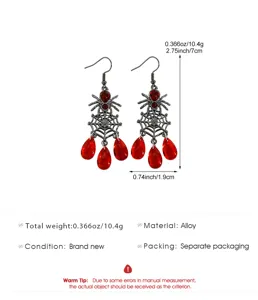 Détails des boucles d'oreilles toile d'araignée avec pierres rouges et dimensions.