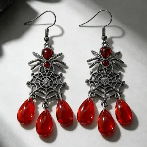 Boucles d'oreilles toile d'araignée gothiques avec gemmes gouttes rouges translucides