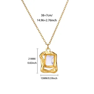 Gedetailleerd overzicht van vintage goudkleurige hanger ketting met maten in cm en inches