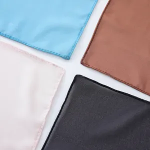 Close-up of four colorful chiffon scarves showing fabric texture and fine stitching