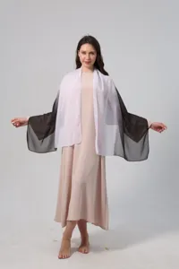 Elegant female model wearing a white to black gradient chiffon scarf and long shawl.