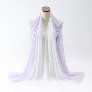 Detailed macro view of lightweight gradient chiffon scarf in soft purple and white