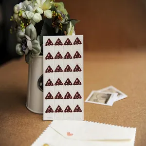 Photo corner stickers detail view, DIY scrapbooking mount stickers, self-adhesive design.