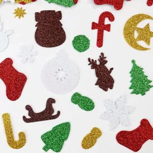 Close-up detail of colorful EVA glitter Christmas foam stickers, assorted holiday craft pieces.