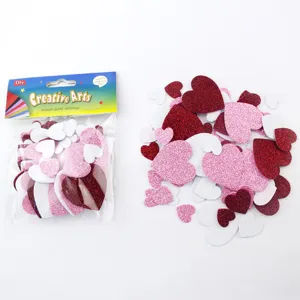 Detail view of glitter EVA foam heart stickers for DIY crafts, kids kindergarten art projects.