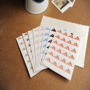 Close-up detail shot of floral photo corners, perfect for diy scrapbooking, picture mounting.