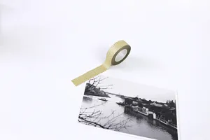 Gold glitter washi tape detail view, perfect for DIY journaling and craft decoration.