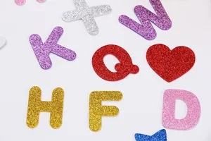 Colorful glitter EVA foam letter stickers for DIY crafts, kids educational toys and party decor.