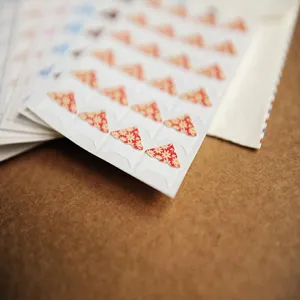Floral photo corners for scrapbooking and DIY picture mounting, decorative sticker sheets for walls.