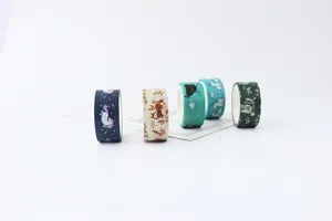 Cute washi tape rolls with adorable animal and unicorn patterns for DIY journaling and art crafts.