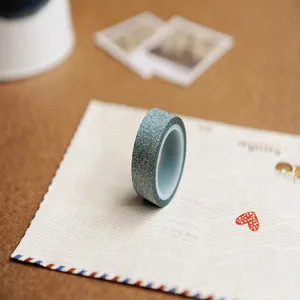 Sparkly glitter washi tape for DIY journaling, decorative masking tape for crafts.