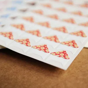 Floral photo corner stickers for scrapbooking, DIY picture frames, and memory albums.