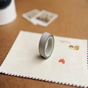 Silver glitter washi tape detail view, perfect for DIY journaling, scrapbooking and decor.