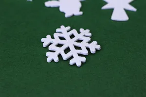 Glitter EVA foam Christmas snowflake stickers for holiday crafts and party decoration.