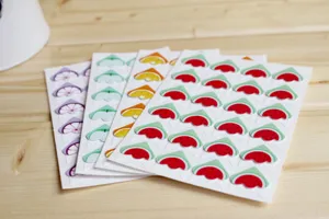 Cute cartoon fruit photo corner stickers for DIY scrapbook album and picture protection.