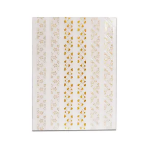 Feuille d'autocollants transparents dores avec motifs de cœurs et etoiles pour album.