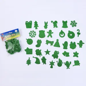 Green glitter EVA foam Christmas stickers featuring snowflakes, trees, and festive holiday shapes.
