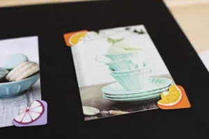 Close-up detail of colorful fruit photo corner stickers showcasing cute design for DIY albums.