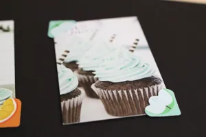Cute green apple paper photo corners for DIY scrapbooking album picture protection detail