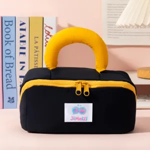 Neceser de maquillaje negro con asa amarilla, bolsa portátil grande para viajes y uso diario.