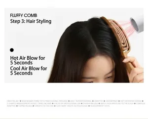 Hair styling detail shot showing hollow massage comb in use with blow dryer for volume.