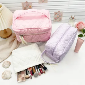 Quilted cosmetic bag set with large capacity, portable zipper makeup organizer for travel daily.