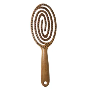 Professional hollow hair brush for women, ergonomic massage comb with spiral design for volume.