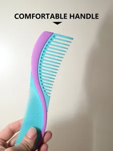 Detail view of a dual-color plastic hair comb with wide and fine teeth for styling.