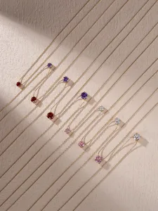 Stainless steel birthstone zirconia necklace featuring colorful solitaire pendants for women.