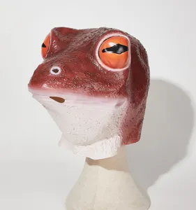 Close-up detail of the funny red-eyed tree frog latex mask prop for party decoration.