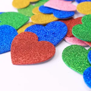 Colorful EVA foam glitter heart stickers with self-adhesive backing for crafts and decor.