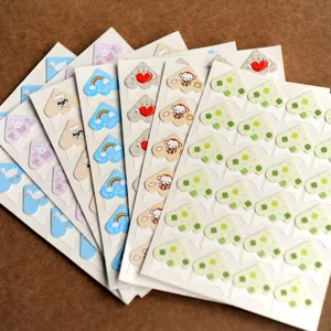 Cartoon paper photo corner stickers for DIY photo albums, cute decorative sticky corners.