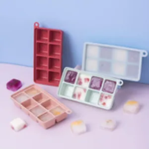 Silicone ice cube tray detail view, flexible multi-compartment mold with lid for easy freezing.
