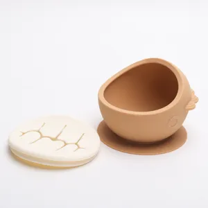 Silicone baby suction bowl with snack lid, anti-drop training tableware for infant feeding.