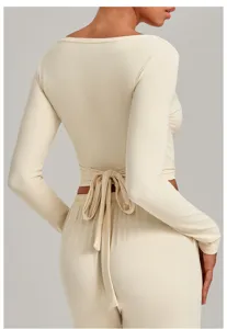 Beige long sleeve wrap crop top yoga activewear with back tie detail for fitness wear