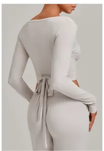 Long sleeve wrap yoga top with back tie strap, light gray fitness sportswear for outdoor workout.