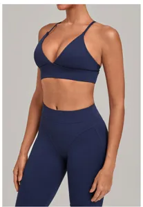 Adjustable strappy back sports bra and high waist fitness yoga leggings set for running wear.
