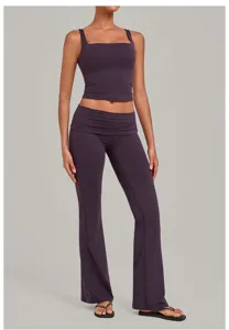 Dark purple two-piece yoga set featuring a square neck crop top and high waist flare pants.