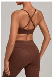 Back detail view of brown adjustable strap sports bra and high-waist yoga leggings set.