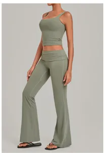 Sage green activewear set featuring a u-neck crop top and fold-over waist flare pants.