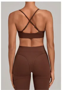 Back detail of brown cross-back sports bra and high waist fitness yoga leggings set.