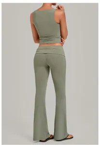 Back view of a sage green yoga set featuring a sleeveless crop top and fold-over flare pants.