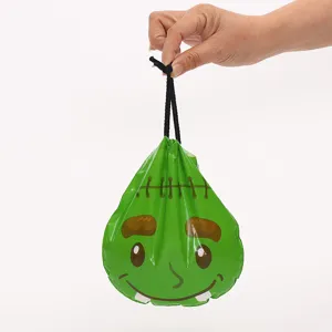Grüner Halloween Monster Kordelzug Bonbon Beutel, festliche Partyverpackung für Geschenke.