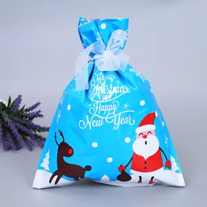Weihnacht Süßigkeiten Geschenktüte, blau Schneeflocke Weihnachtsmann Design mit weißer Schleife.