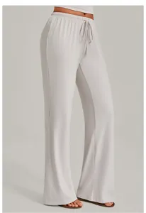 Comfortable loose wide-leg yoga pants for women with adjustable drawstring waist and drapes.