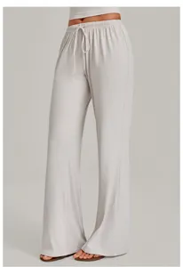 Women casual straight leg yoga pants featuring elastic drawstring waist and smooth drape.