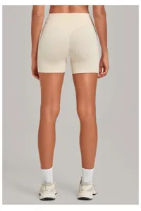 Back view of high waist yoga shorts featuring a stylish crossover waistband and snug fit.